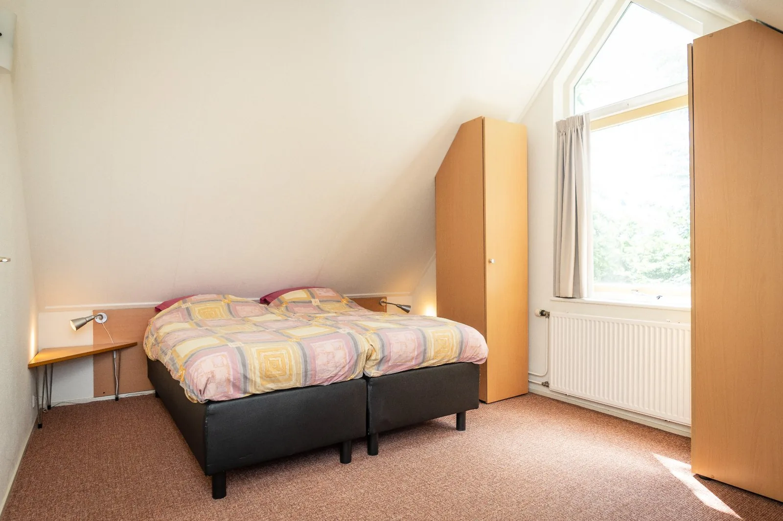 Tweede slaapkamer op de eerste verdieping van het vakantiehuis